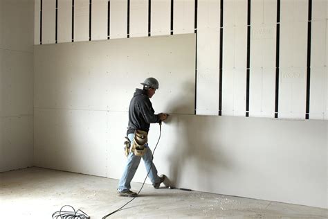 attaching sheet metal to drywall|adhesive for metal to drywall.